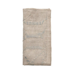 Variegated linen napkin in natural and grey tones with jacquard-style texture folded on white background – Amiramour