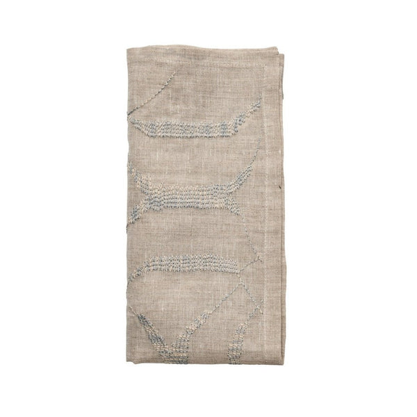 Variegated linen napkin in natural and grey tones with jacquard-style texture folded on white background – Amiramour