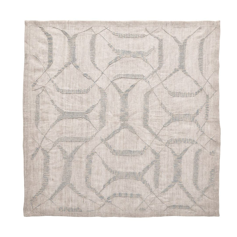 Variegated linen napkin in natural and grey tones unwraped on white background