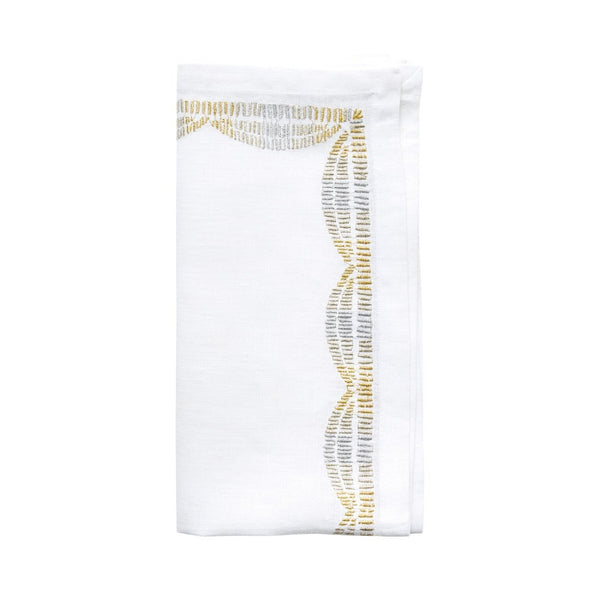 Patina linen napkin by Kim Seybert folded on white background