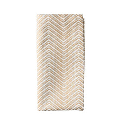 Drift cotton napkin with hand-printed gold and silver chevron design on a white background Amiramour