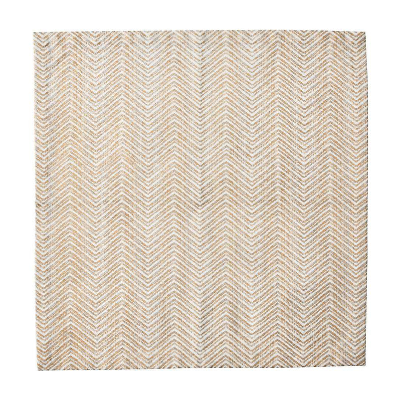 Drift cotton napkin with hand-printed gold and silver chevron design on a white background 