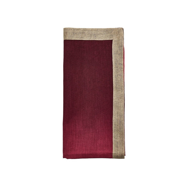 Hand-dyed Dip Dye linen napkin in red  and plum ombre with metallic foil border folded.