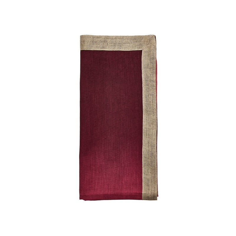 Hand-dyed Dip Dye linen napkin in red  and plum ombre with metallic foil border folded.