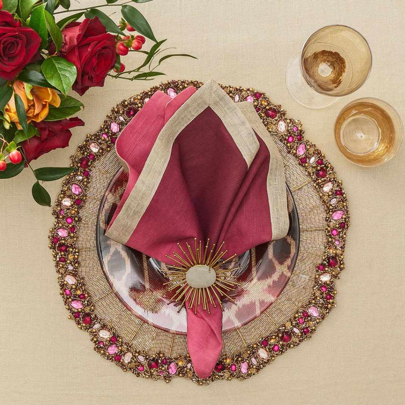 Dip Dye linen napkin in red and plum ombre with metallic foil border styled with gold napkin ring.