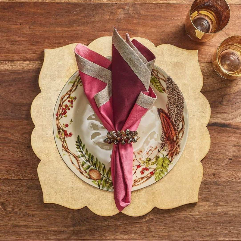 Dip Dye linen napkin in red and plum ombre with metallic foil border styled on rustic plate.