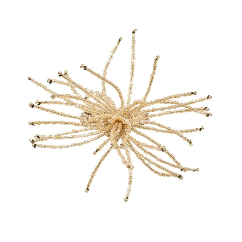 Top view of sparkling Spider Bead Burst Napkin Ring in champagne by Kim Seybert