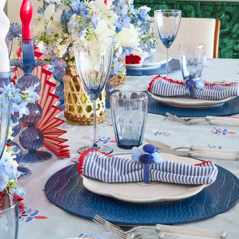 Luxury Sea Stone Napkin Ring in navy with natural stone design styled on forth of july table setting.