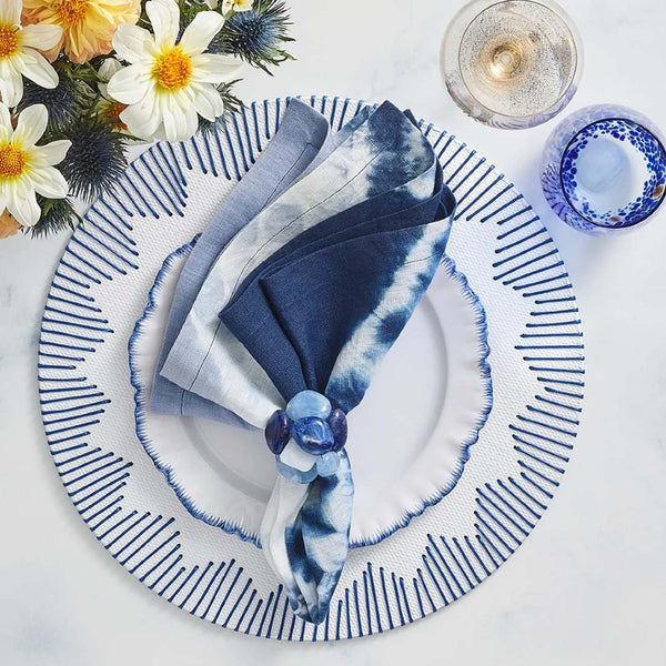 Luxury Sea Stone Napkin Ring in navy with natural stone design styled with navy napkin.