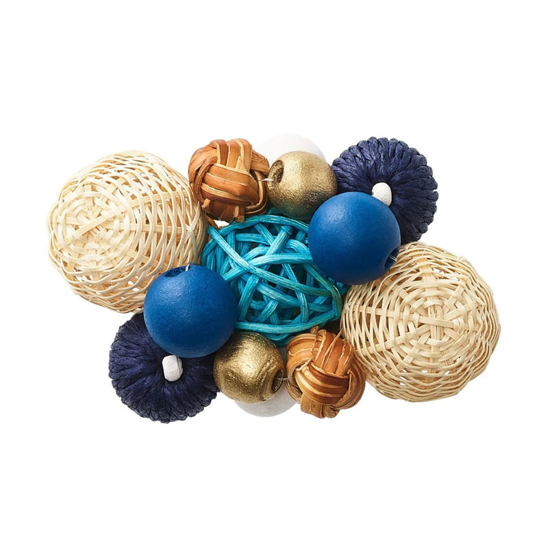 Top view of handcrafted rattan and wood bead napkin ring by Kim Seybert