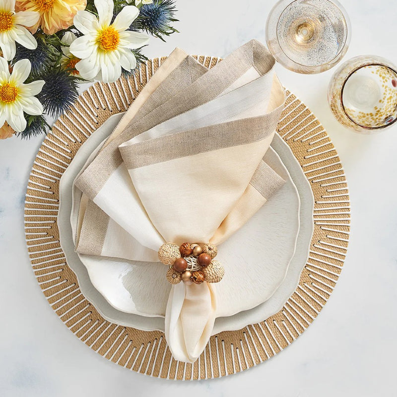 Rustic table setting with Java Napkin Ring in natural tones by Kim Seybert