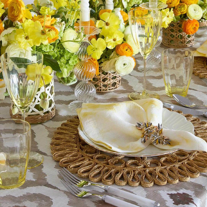 Summer table in soft natural tones with Butterflies Napkin Ring in champagne by Kim Seybert