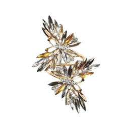 Top view of layered butterfly napkin ring in champagne metal with gems and rhinestones by Kim Seybert
