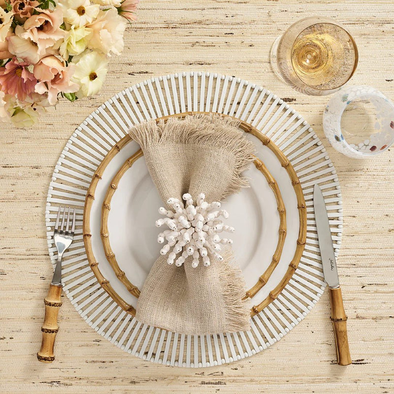 Boho-inspired table setting with white Reed Napkin Ring by Kim Seybert