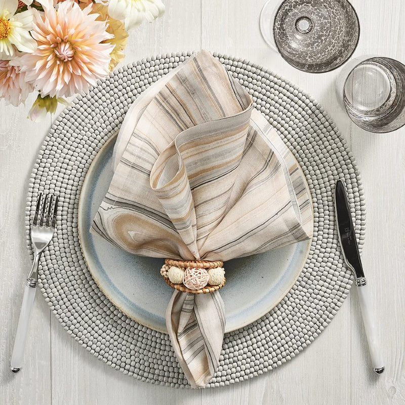 Elegant beach-inspired table with natural Playa Napkin Ring, sold by Amiramour