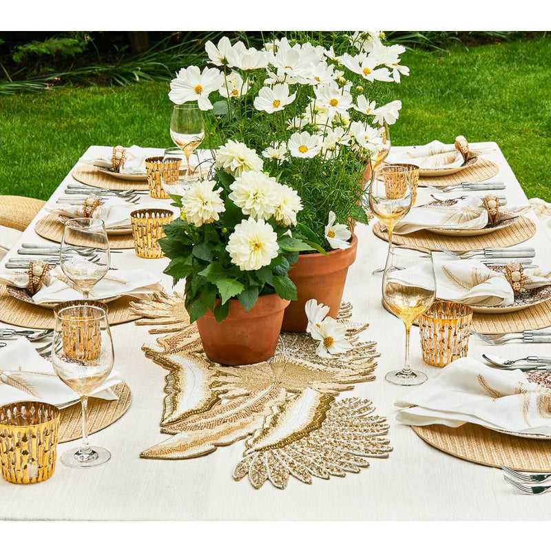 Full view of summer table setting featuring Playa Napkin Ring by Kim Seybert