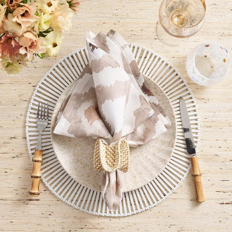 White and light brown table setting with natural Ruffle Rattan Napkin Ring