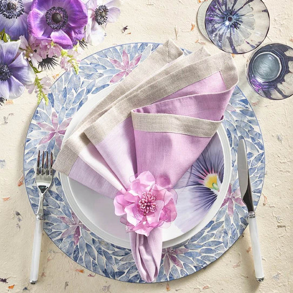 Lilac Gardenia Napkin Ring by Kim Seybert styled in a soft spring table arrangement with pastel tones and floral elements