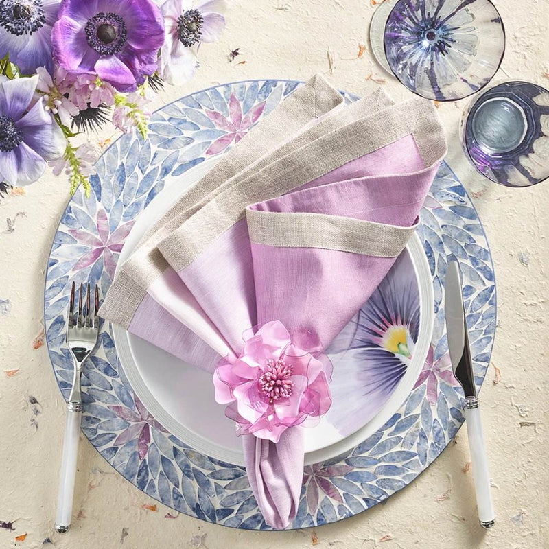 Lilac Gardenia Napkin Ring by Kim Seybert styled in a soft spring table arrangement with pastel tones and floral elements