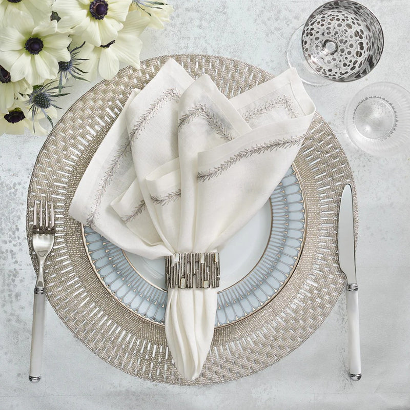 Refined tablescape in neutral tones showcasing the silver Matrix napkin ring