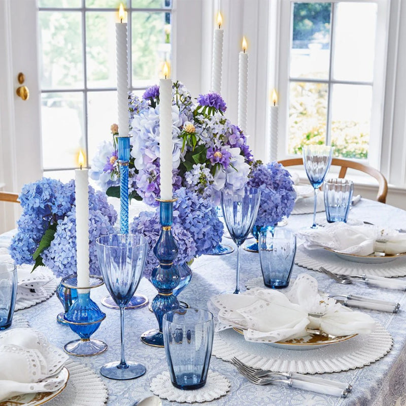 Sophisticated blue periwinkle table setting showcasing Cosmos napkin rings by Kim Seybert