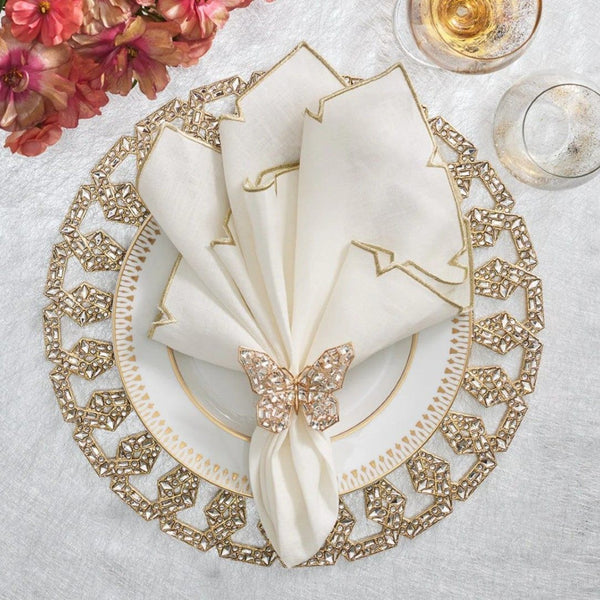 Elegant gold and white table setting with crystal butterfly Papillon Napkin Ring by Kim Seybert