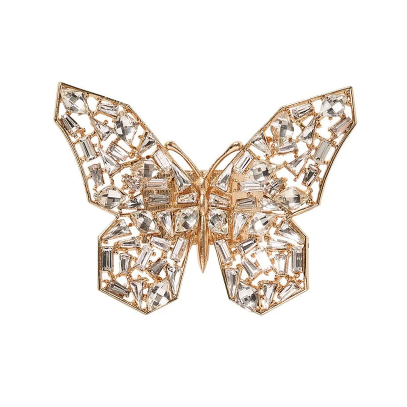 Top view of butterfly-shaped gold napkin ring with clear crystals by Kim Seybert