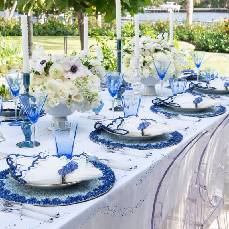 Spring dining setup with navy blue and white tones featuring Pop Rocks rings