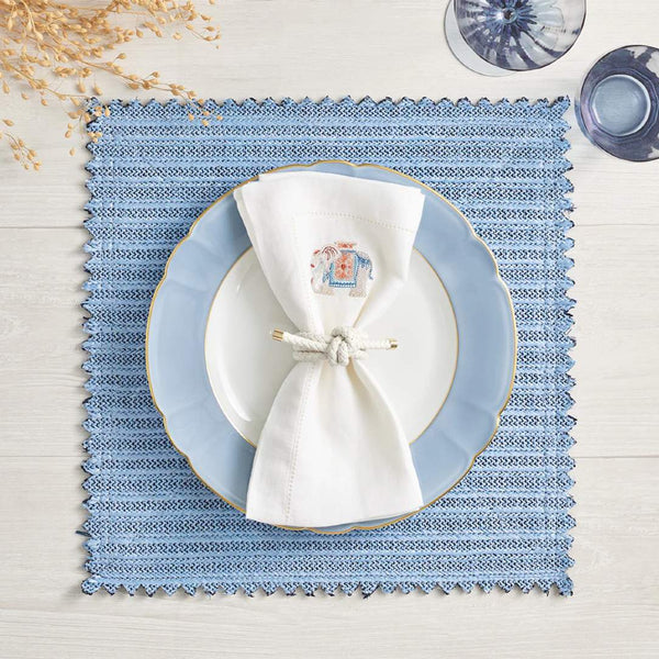Luxury napkin Rope Knot in White by Kim Seybert on blue placemat