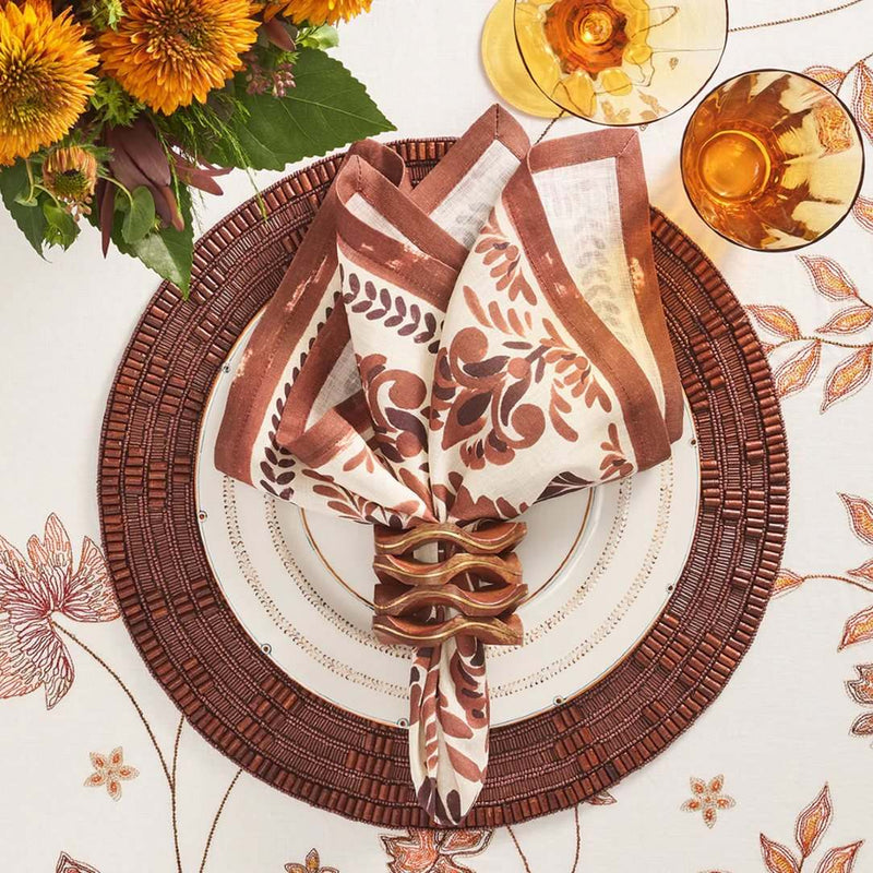 Table setting in brown tones with Pavilion Napkin Ring by Kim Seybert, sold by Amiramour