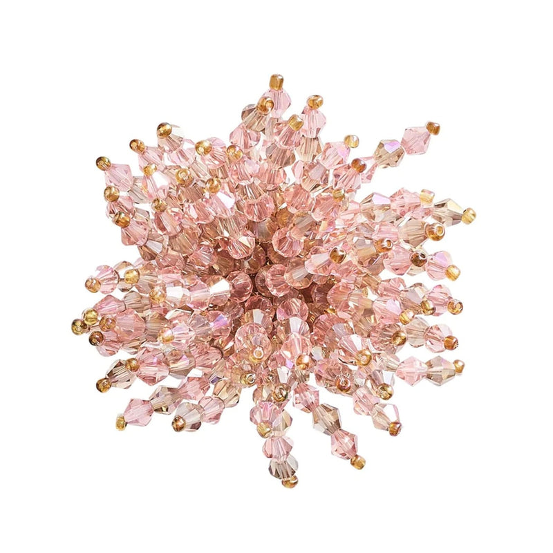 Top view of Brilliant blush pink napkin ring by Kim Seybert, elegant handcrafted design available at Amiramour