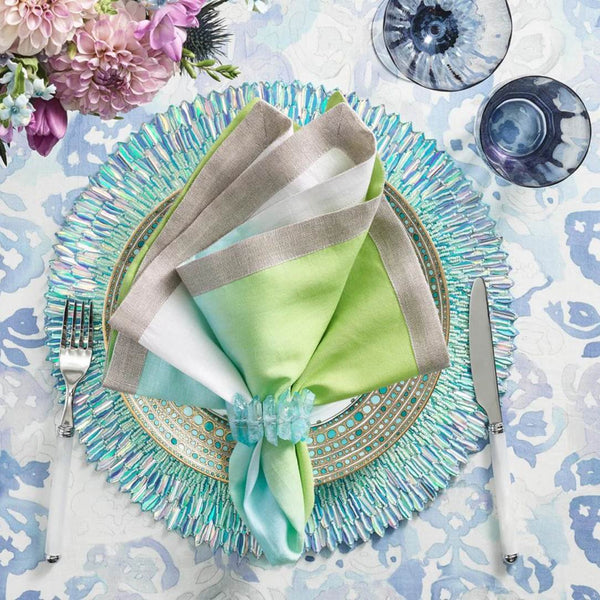 Summer table in seafoam, turquoise, lime, and white tones featuring Radiant Napkin Rings by Kim Seybert