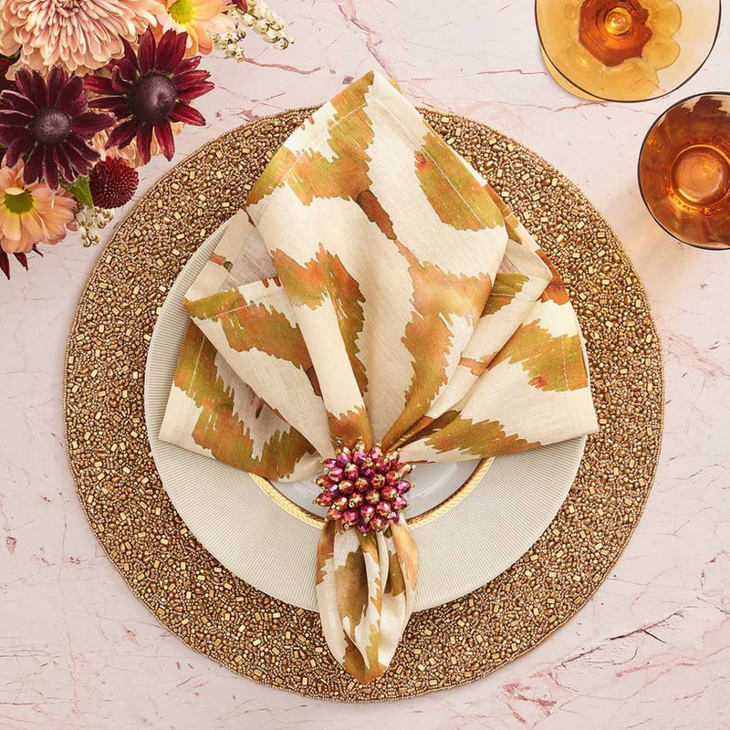 Autumn-inspired table with plum and gold Zinnia Napkin Ring by Kim Seybert, styled in rich seasonal hues