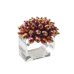 Zinnia Napkin Ring in plum and gold by Kim Seybert on white background, with beaded petals and a clear acrylic base