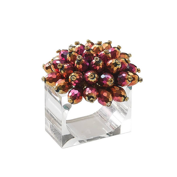 Zinnia Napkin Ring in plum and gold by Kim Seybert on white background, with beaded petals and a clear acrylic base