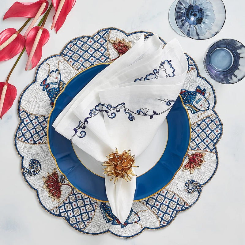 Maritime-inspired blue and white table décor with Starburst Napkin Ring by Kim Seybert