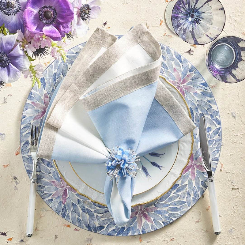 Pastel floral table setting with Starburst Napkin Rings in periwinkle blue and lilac