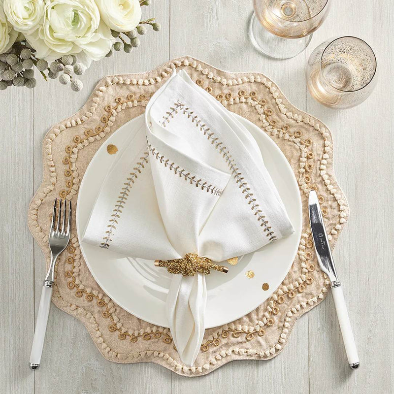 Elegant cream and white table setting with gold Glam Knot Napkin Ring by Kim Seybert