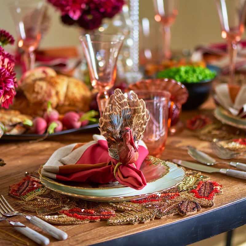 Thanksgiving feast table with Gobble Napkin Ring and seasonal décor by Kim Seybert