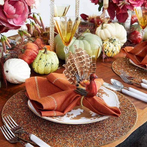 Warm autumn table setting with Gobble Napkin Ring by Kim Seybert