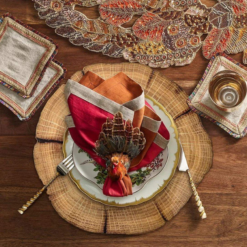 Fall-inspired dining table featuring Gobble Napkin Ring in natural feather hues