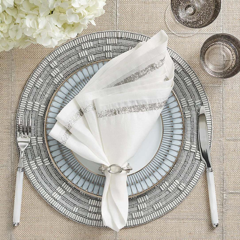Sophisticated table setting with silver Chain Link napkin ring by Kim Seybert, styled for Amiramour