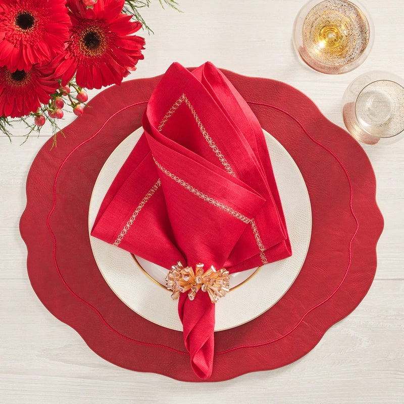 Festive red-accented table décor with Dazzle Napkin Ring in champagne by Kim Seybert