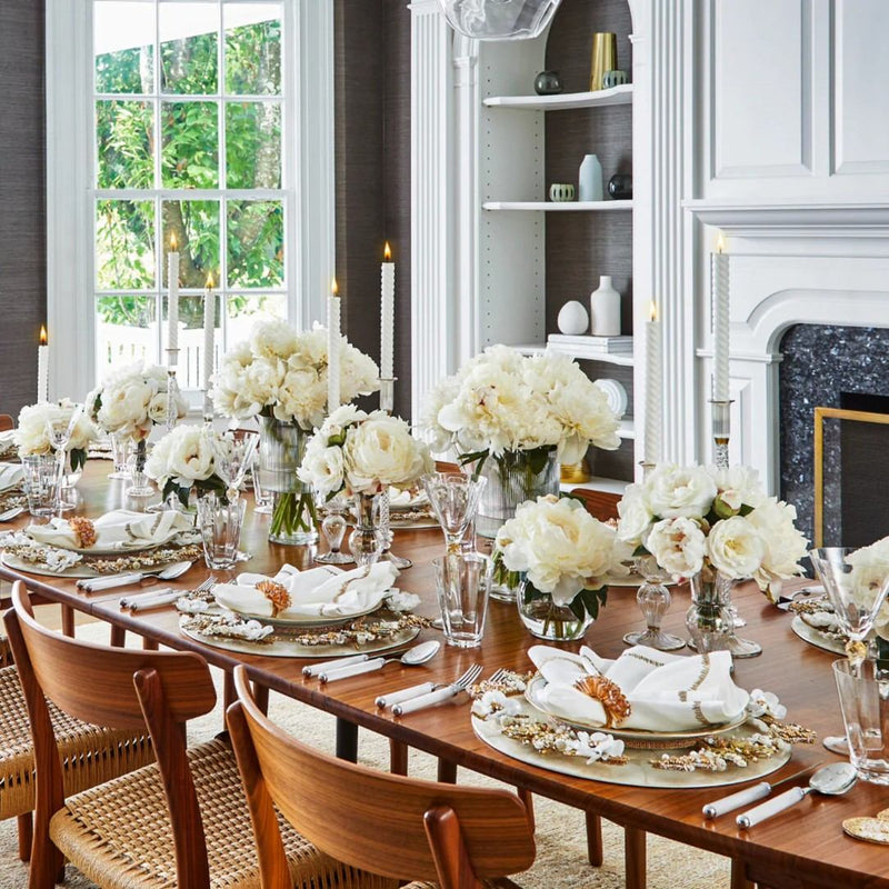 Premium floral table arrangement with white flowers and Dazzle Napkin Ring by Kim Seybert