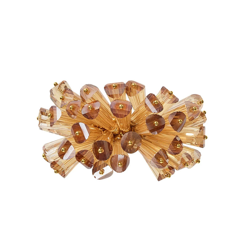 Top view of intricate faceted glass beads on champagne Dazzle Napkin Ring by Kim Seybert