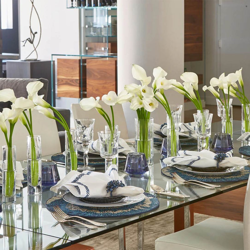 Springtime navy and white dining table with Dazzle napkin rings, full view