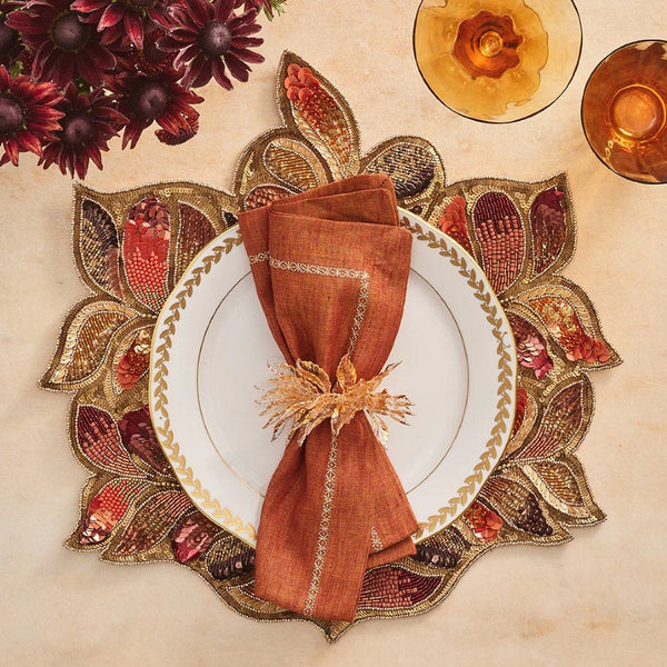 Autumn table setting with gold Gilded Leaves Napkin Ring by Kim Seybert