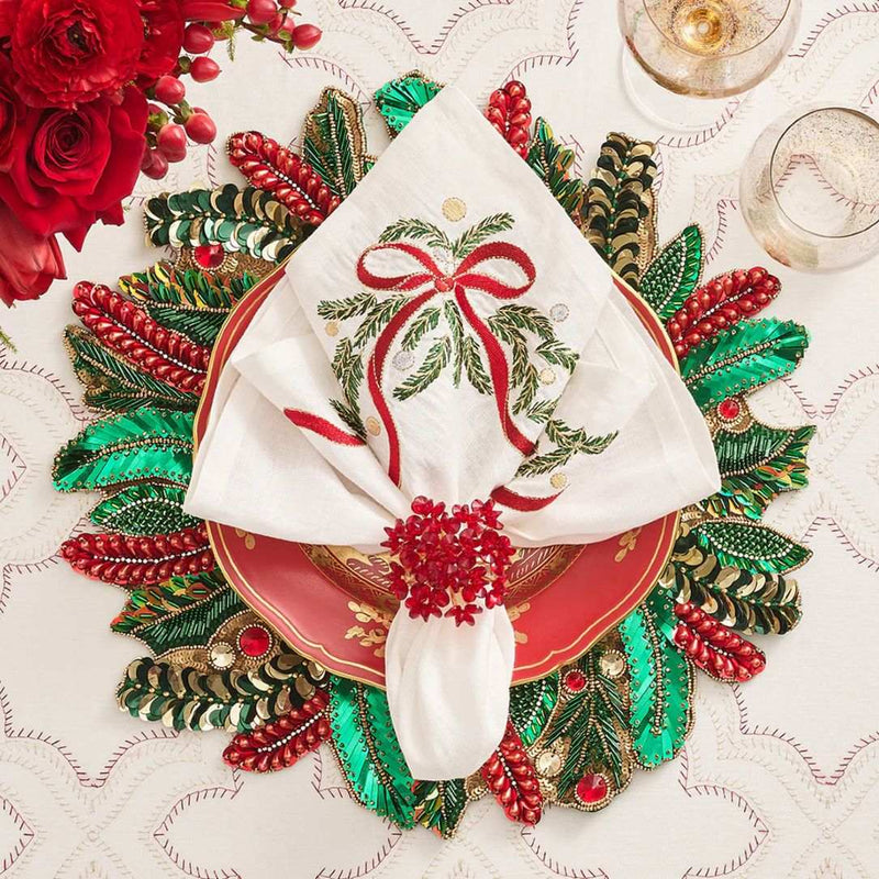 Luxury Christmas tablescape with red beaded Aster Napkin Rings by Kim Seybert in festive tones