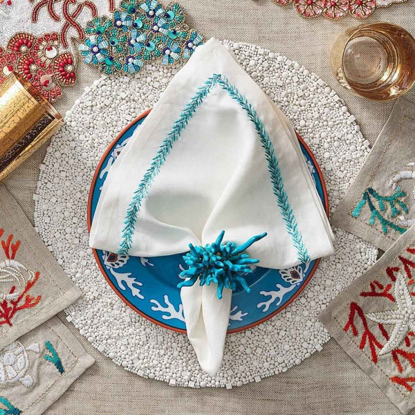 Poolside summer table featuring turquoise Amalfi Napkin Rings and coastal décor
