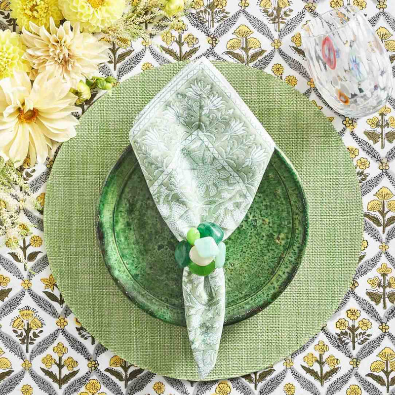 Bright summer table setting in shades of green and pastel featuring Sea Stone Napkin Ring